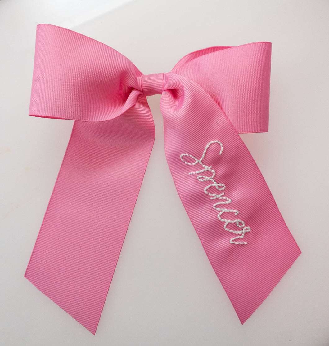 White Name on Hot Pink Ribbon